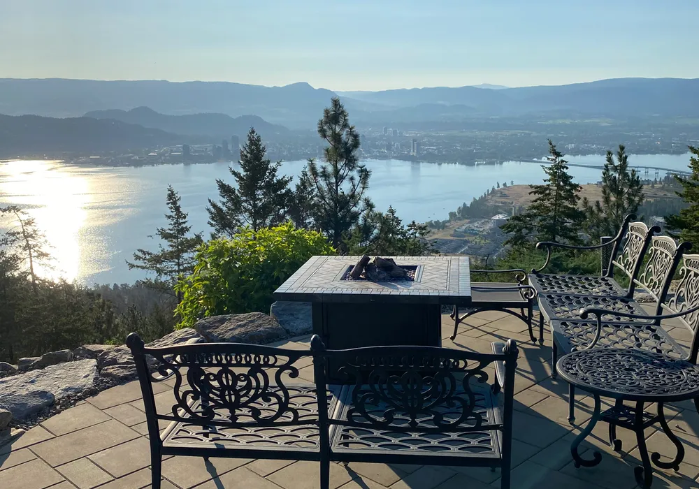 chairs and kelowna view of lake and city