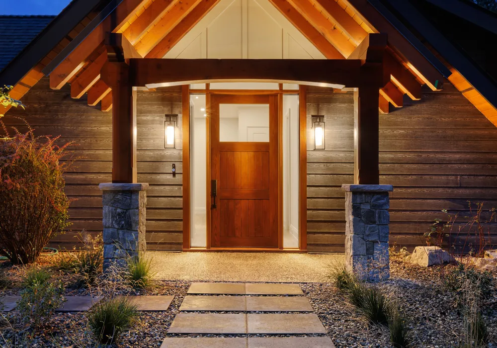 modern home and stone walkway and grasses