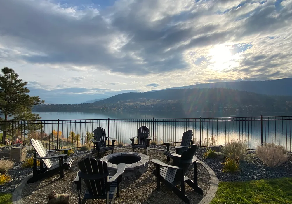 view of kelowna top and firepit and lake