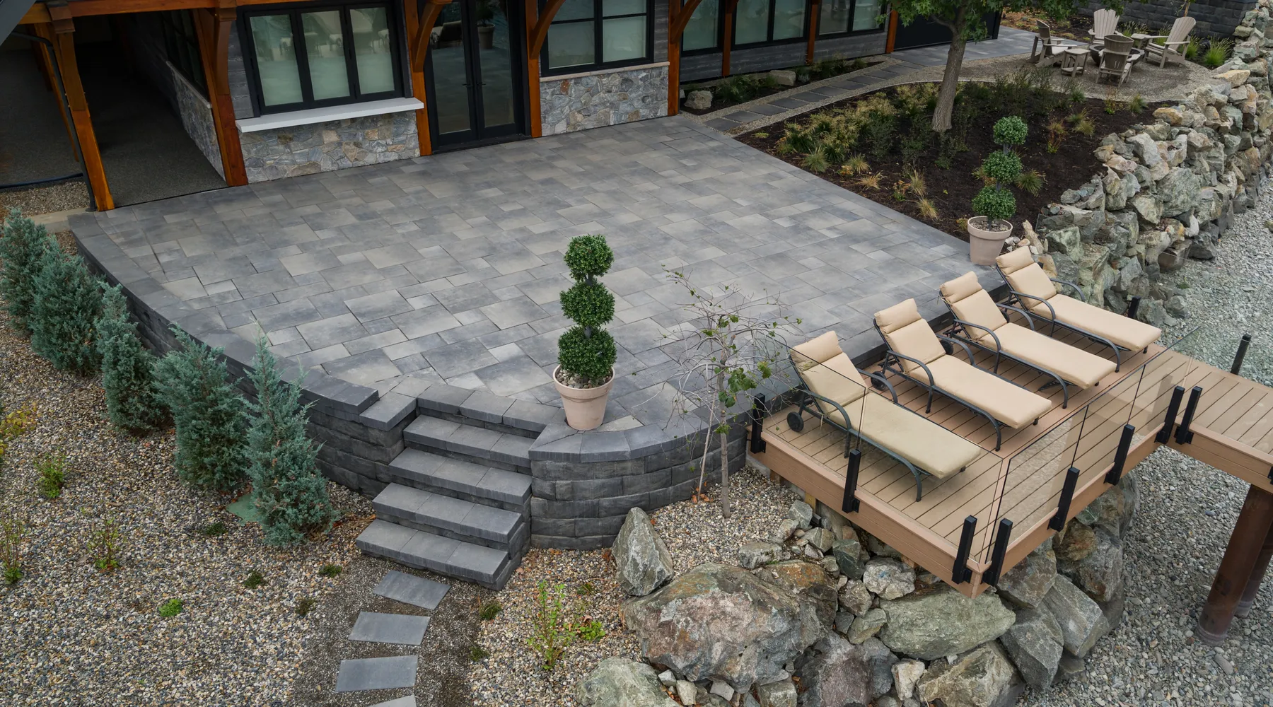 lakefront property with walkway retaining wall and stairs